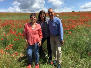 Pat Fiorello, Linda and Michael Mele enjoy the field of poppies